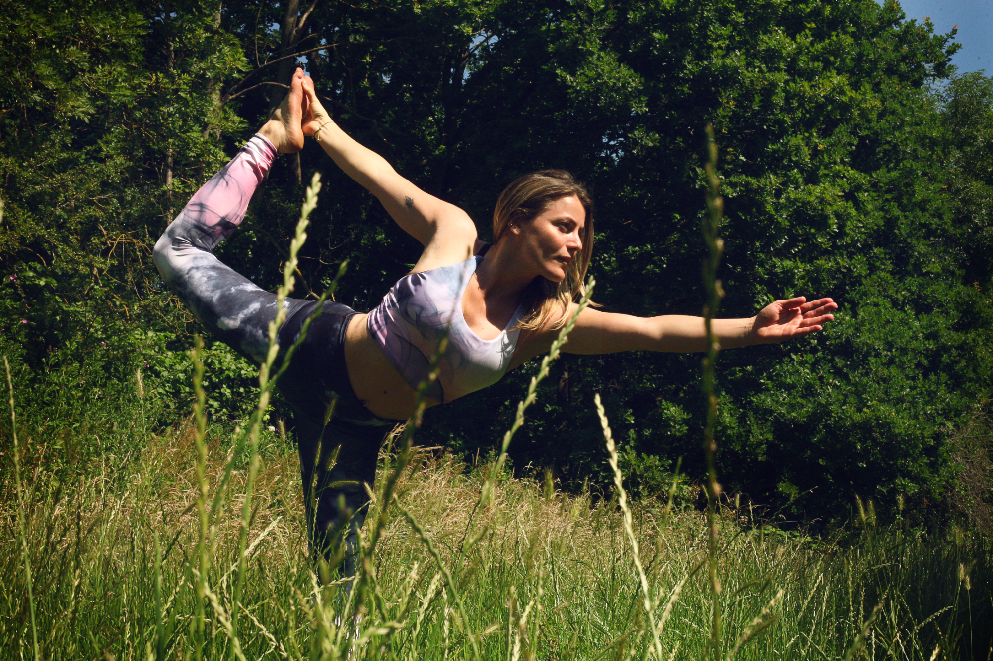 The dancer pose in yoga.